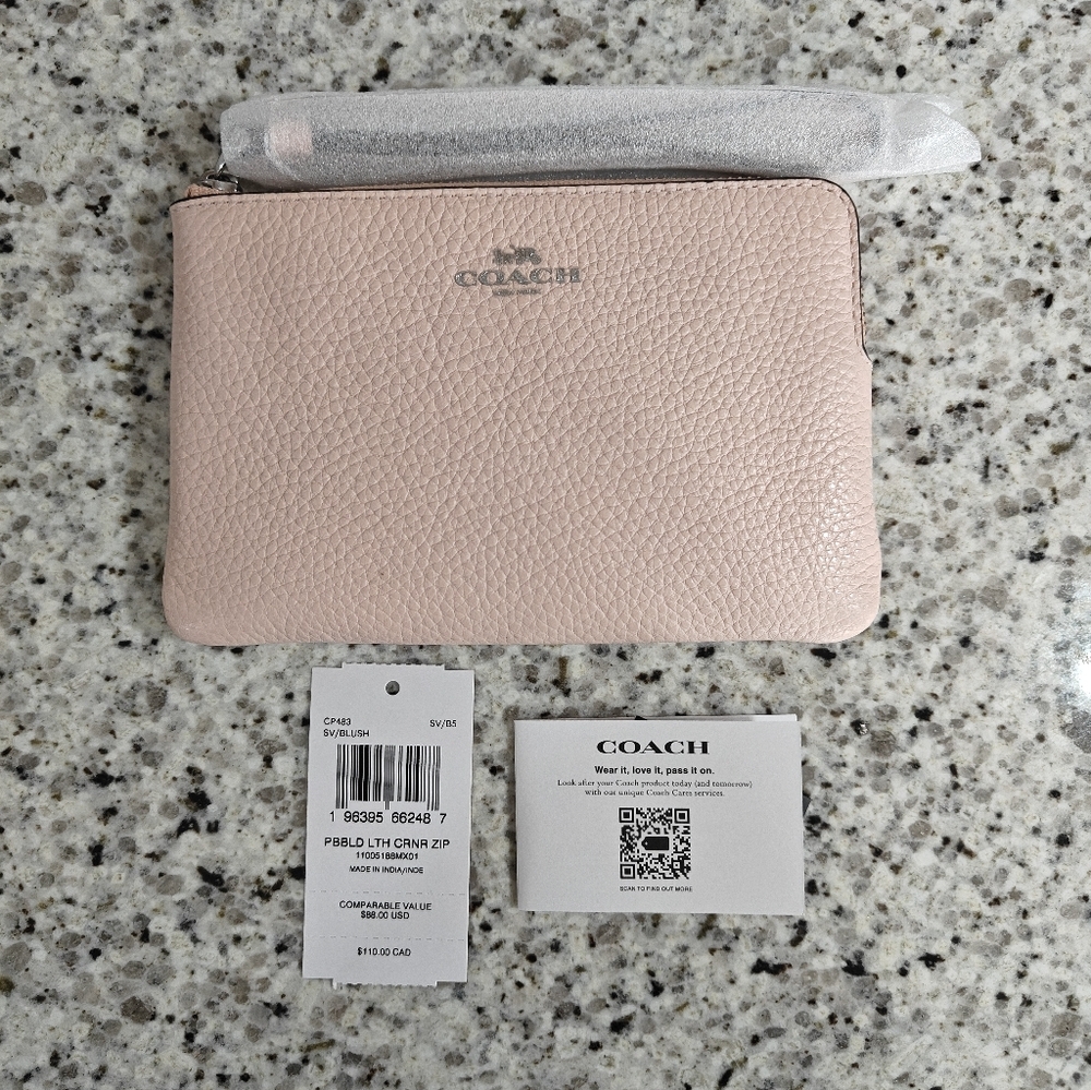 Coach Corner Zip Wristlet in Pink